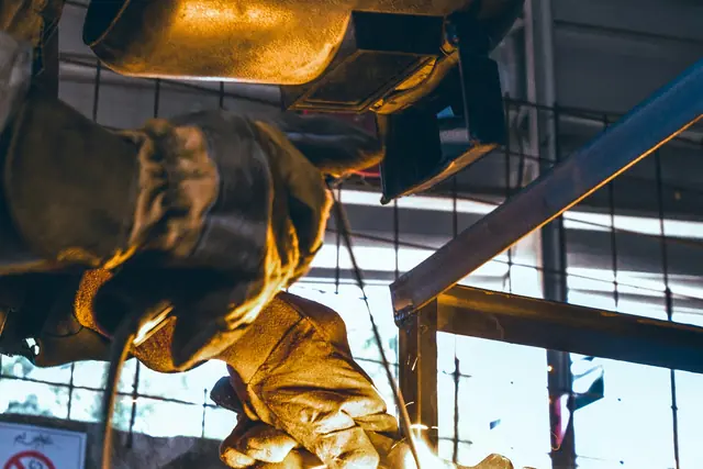 A welder works in a workshop in Bogor, Indonesia