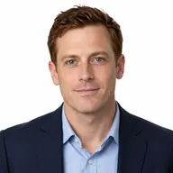 Oliver Clarke desk portrait